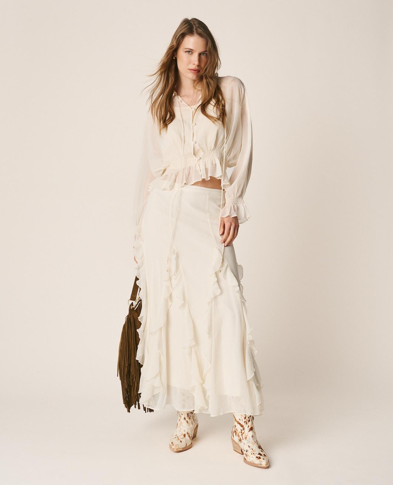 BLUSA SEMITRANSPARENTE VOLANTES