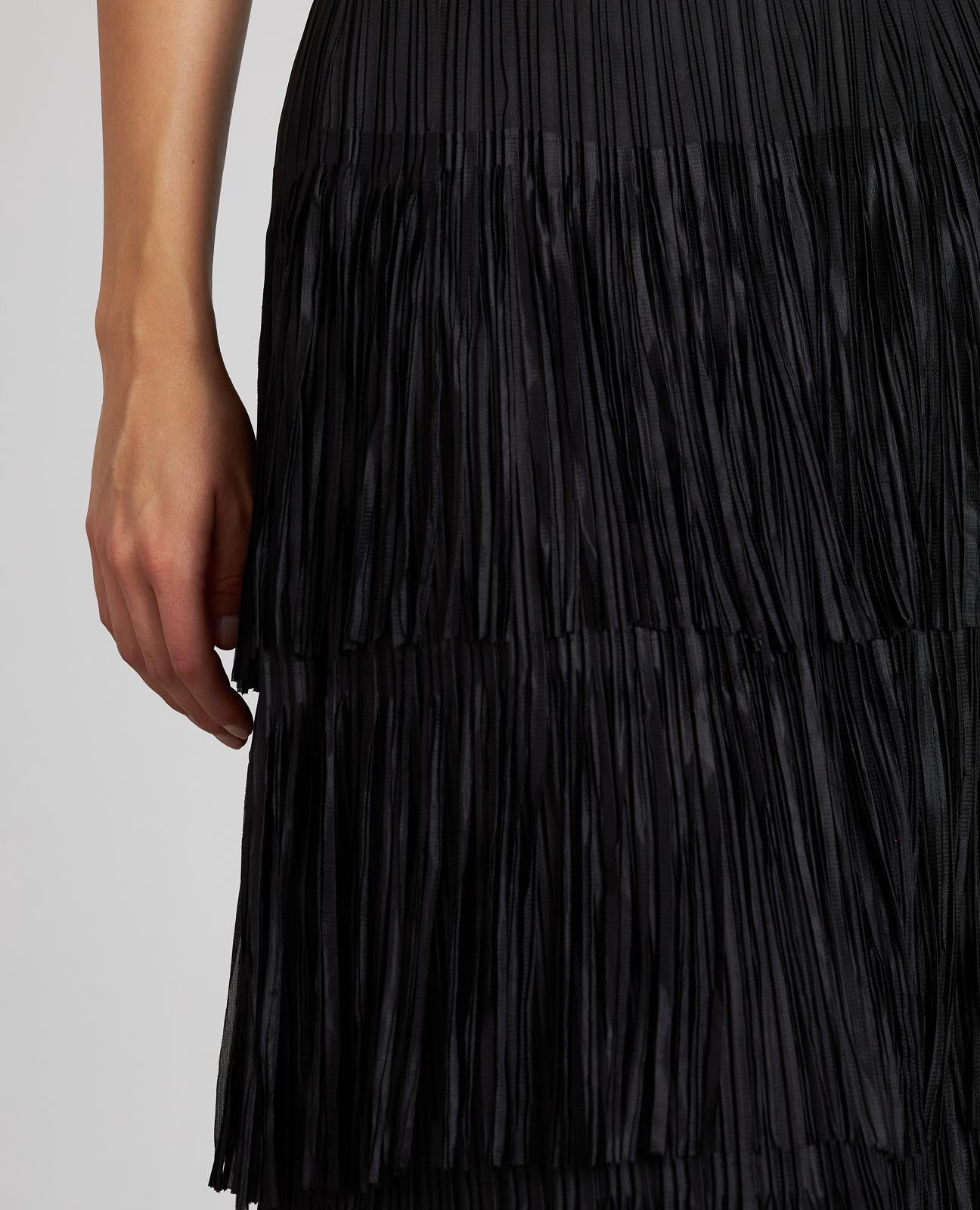 FALDA CUBIERTA CON FLECOS