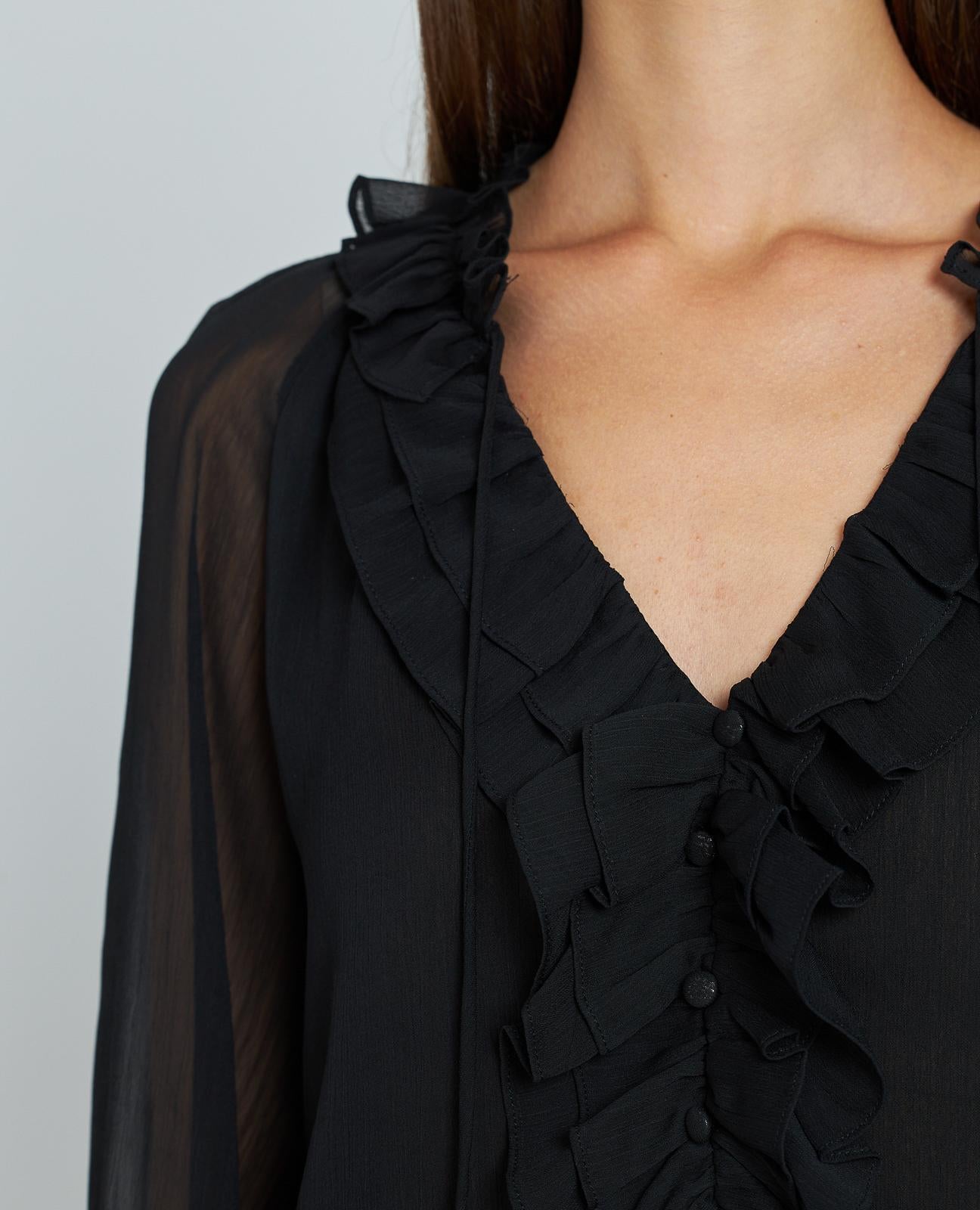 BLUSA CON VOLANTES