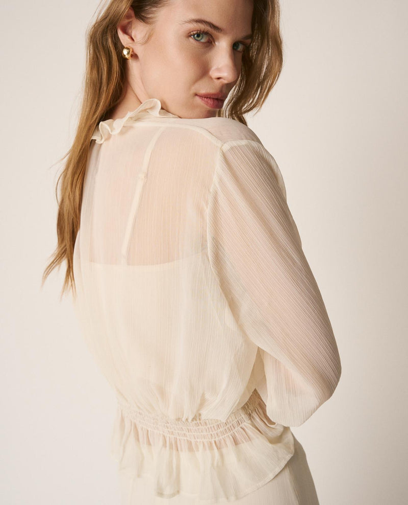 BLUSA SEMITRANSPARENTE VOLANTES