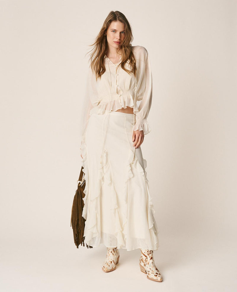 BLUSA SEMITRANSPARENTE VOLANTES