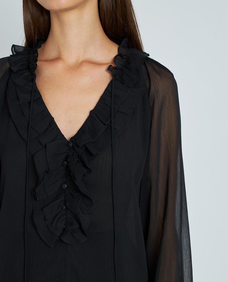 BLUSA CON VOLANTES