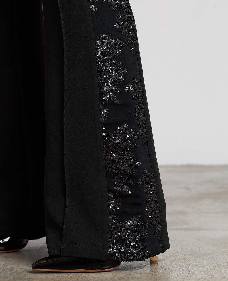 PANTALÓN FLARE DETALLES