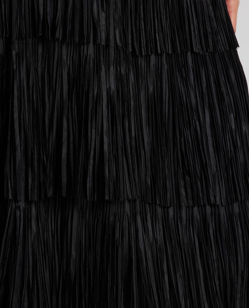 FALDA CUBIERTA CON FLECOS